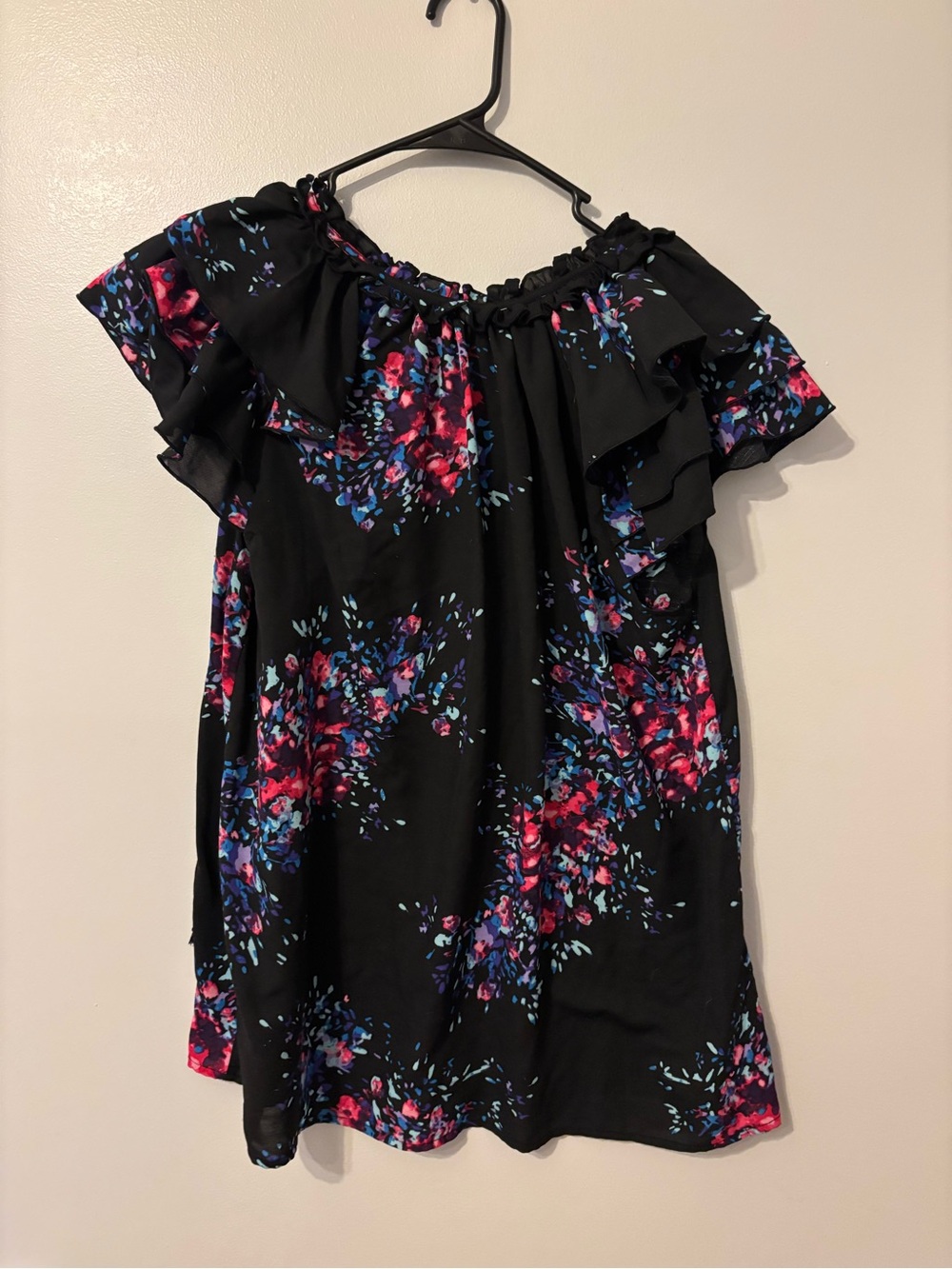 Black floral print short sleeve tie neck blouse